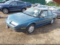 1992 Saturn Sl1 — photo 2 of 12 | VIN 1G8ZH5598NZ204045