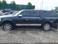 2011 Lincoln Navigator — photo 14 of 17 | VIN 5LMJJ3J51BEJ05142