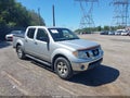 2009 Nissan Frontier — photo 1 of 16 | VIN 1N6AD07W49C403782