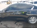 2015 Infiniti Q50 — photo 14 of 16 | VIN JN1BV7AP1FM343712