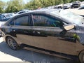 2021 Kia Forte — photo 12 of 15 | VIN 3KPF34AD9ME264700
