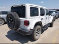 2020 Jeep Wrangler Unlimited — photo 4 of 16 | VIN 1C4HJXFN9LW176431