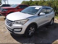 2013 Hyundai Santa Fe — photo 2 of 16 | VIN 5XYZU3LA5DG047767