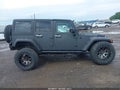 2016 Jeep Wrangler Unlimited — photo 14 of 18 | VIN 1C4HJWFG4GL178705