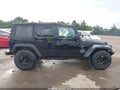 2012 Jeep Wrangler Unlimited — photo 13 of 16 | VIN 1C4BJWDG2CL121535