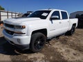 2016 Chevrolet Silverado 1500 — photo 2 of 16 | VIN 3GCUKREC6GG301395