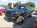 2012 Toyota Tacoma — photo 2 of 16 | VIN 5TFJU4GNXCX028465