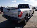 2016 Nissan Titan — photo 4 of 16 | VIN 1N6BA1F40GN508114