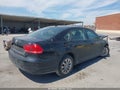 2015 Volkswagen Passat — photo 4 of 16 | VIN 1VWAT7A30FC040709