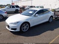 2016 Tesla Model S — photo 2 of 20 | VIN 5YJSA1E28GF127256