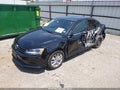 2016 Volkswagen Jetta — photo 2 of 16 | VIN 3VWD67AJ3GM394551