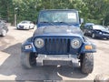 2000 Jeep Wrangler — photo 13 of 17 | VIN 1J4FA29P9YP749749