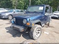2000 Jeep Wrangler — photo 2 of 17 | VIN 1J4FA29P9YP749749