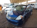 2010 Nissan Versa — photo 2 of 11 | VIN 3N1CC1AP8AL459564