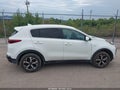 2020 Kia Sportage — photo 14 of 17 | VIN KNDPMCAC3L7827984