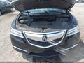 2014 Acura MDX — photo 10 of 17 | VIN 5FRYD3H25EB006561