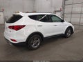 2017 Hyundai Santa Fe — photo 4 of 16 | VIN 5NMZUDLB2HH029608