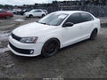 2014 Volkswagen Jetta — photo 2 of 17 | VIN 3VW4S7AJ8EM208477