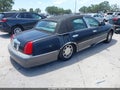 2002 Lincoln Town Car — photo 4 of 11 | VIN 1LNHM82WX2Y637498
