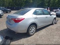 2018 Toyota Corolla — photo 4 of 17 | VIN 5YFBURHE2JP764926