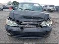 2003 Toyota Avalon — photo 12 of 16 | VIN 4T1BF28B83U335301