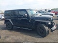 2019 Jeep Wrangler Unlimited — photo 13 of 16 | VIN 1C4HJXDG4KW650823