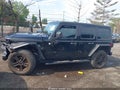 2019 Jeep Wrangler Unlimited — photo 14 of 16 | VIN 1C4HJXDG4KW650823