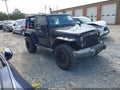 2015 Jeep Wrangler — photo 1 of 16 | VIN 1C4AJWAG6FL550021