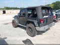2015 Jeep Wrangler — photo 3 of 16 | VIN 1C4AJWAG6FL550021