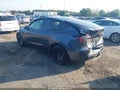 2023 Tesla Model Y — photo 3 of 15 | VIN 7SAYGDEF2PF700393
