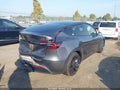 2023 Tesla Model Y — photo 4 of 15 | VIN 7SAYGDEF2PF700393