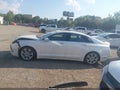 2014 Lincoln MKZ — photo 13 of 17 | VIN 3LN6L2LU4ER820709
