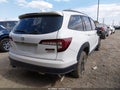 2022 Honda Pilot — photo 4 of 16 | VIN 5FNYF6H88NB077884