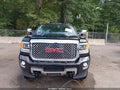 2016 GMC Sierra — photo 12 of 16 | VIN 1GT12UE84GF245282