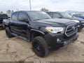 2017 Toyota Tacoma — photo 1 of 16 | VIN 5TFAX5GN2HX089894