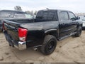 2017 Toyota Tacoma — photo 4 of 16 | VIN 5TFAX5GN2HX089894