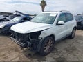 2015 Volkswagen Tiguan — photo 2 of 17 | VIN WVGAV7AX7FW592945