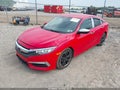 2016 Honda Civic — photo 2 of 19 | VIN 2HGFC2F54GH574513