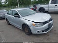 2014 Volkswagen Jetta — photo 1 of 16 | VIN 3VW2K7AJ1EM357692