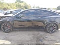 2023 Tesla Model Y — photo 14 of 18 | VIN 7SAYGDEF4PF915077