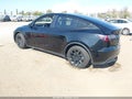 2021 Tesla Model Y — photo 3 of 17 | VIN 5YJYGDEE2MF218605