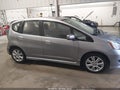 2009 Honda Fit — photo 13 of 16 | VIN JHMGE874X9S059077