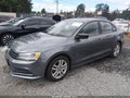 2015 Volkswagen Jetta — photo 2 of 18 | VIN 3VWLA7AJ4FM211649