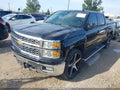 2014 Chevrolet Silverado 1500 — photo 2 of 16 | VIN 3GCUKREC3EG515337
