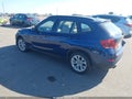 2014 BMW X1 — photo 3 of 17 | VIN WBAVL1C55EVY12203