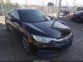 2018 Honda Civic — photo 1 of 19 | VIN 2HGFC4B06JH308973