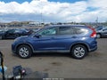 2013 Honda CR-V — photo 14 of 16 | VIN 2HKRM4H77DH636010