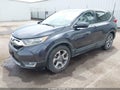 2017 Honda CR-V — photo 2 of 15 | VIN 7FARW1H55HE039292