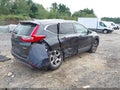 2017 Honda CR-V — photo 4 of 16 | VIN 2HKRW2H80HH611947