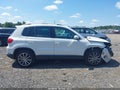 2013 Volkswagen Tiguan — photo 14 of 17 | VIN WVGAV7AX9DW547731